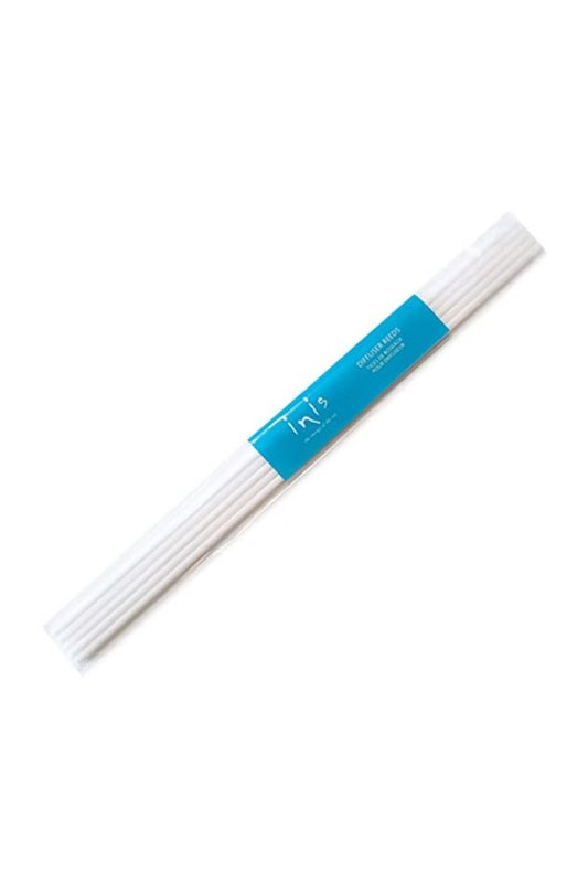 Pack of five white Inis diffuser reeds with a blue branded paper band on a white background